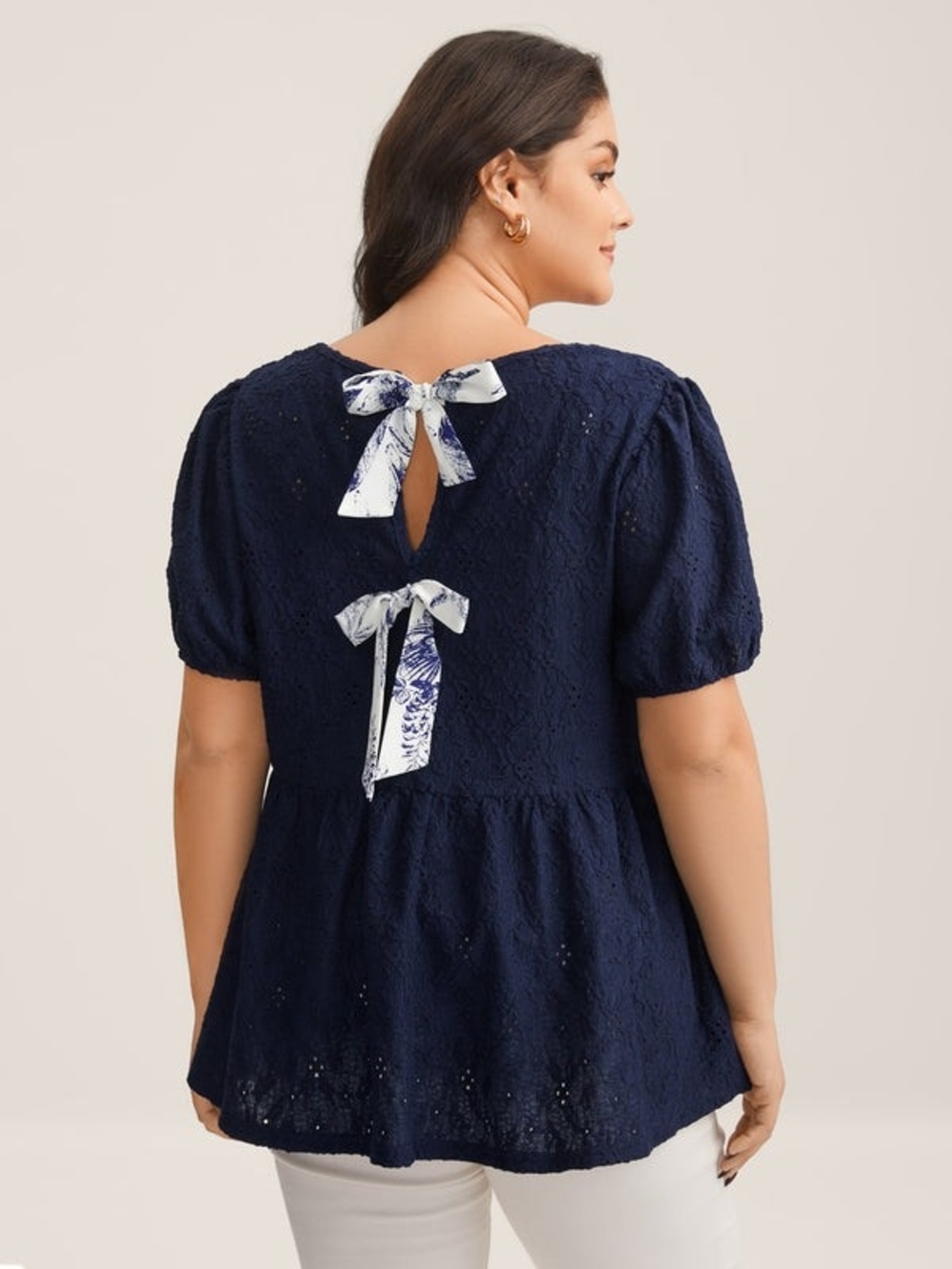 BloomChic Back Bow Tie Textured Navy Eyelet Puff-Sleeve Peplum Top